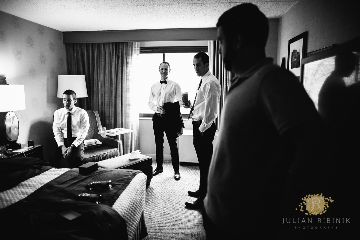 A black and white photo of groom and his friends