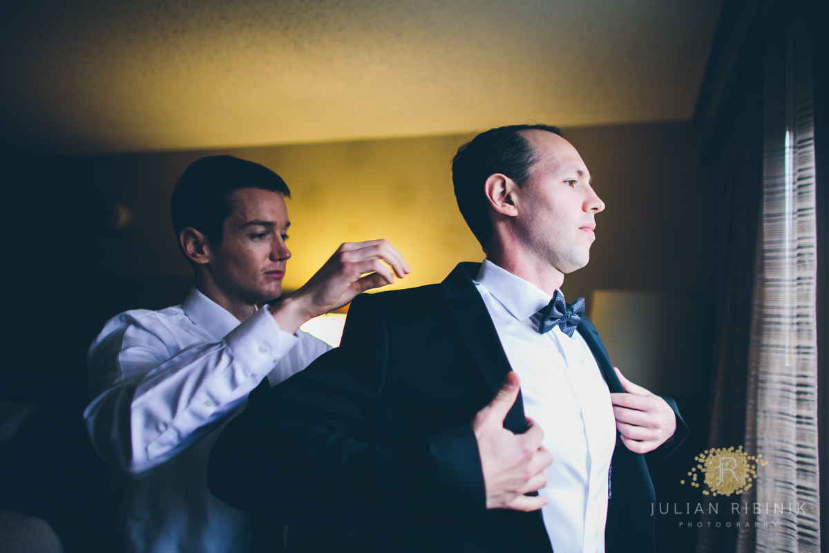 The groom getting dressed for the big day