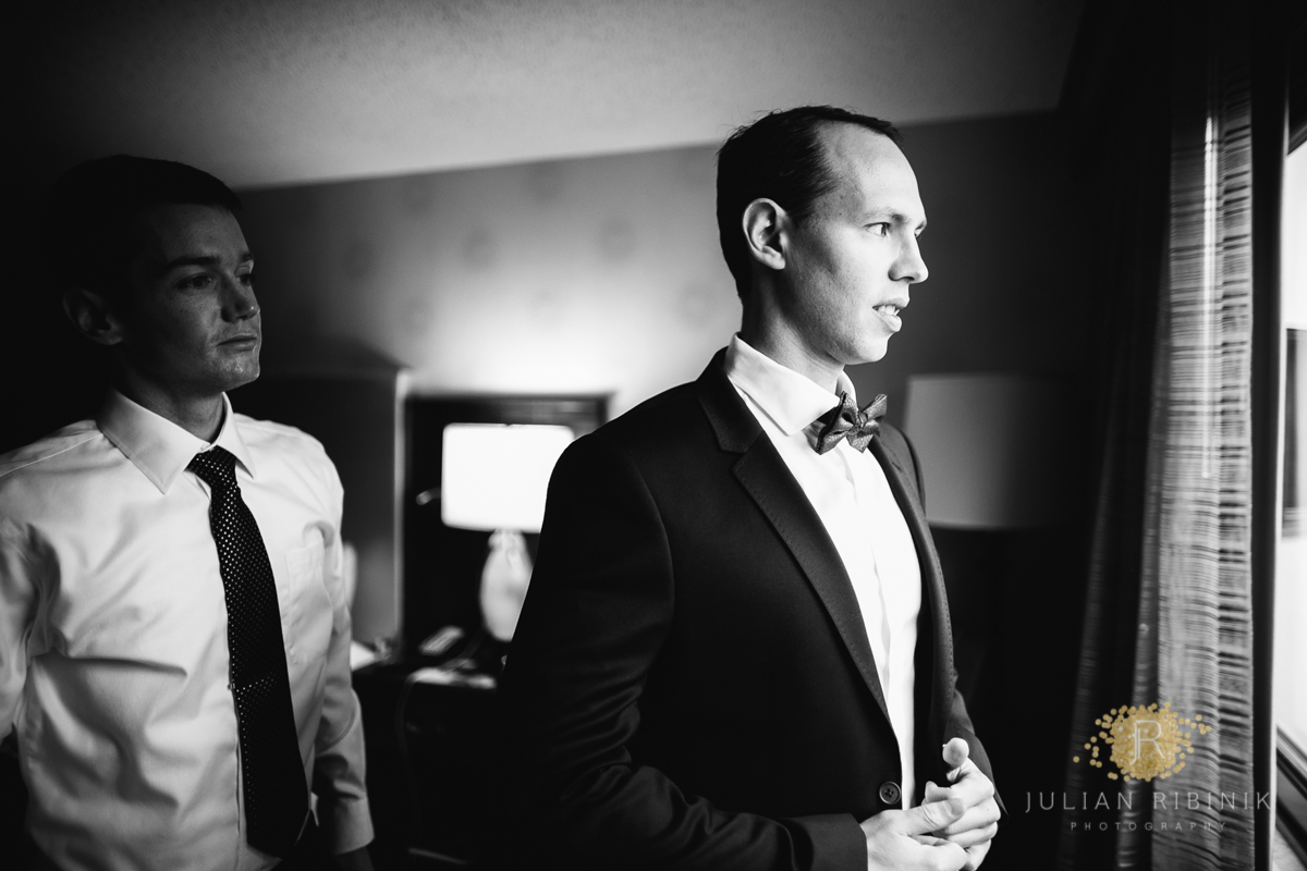 A black and white photo of groom