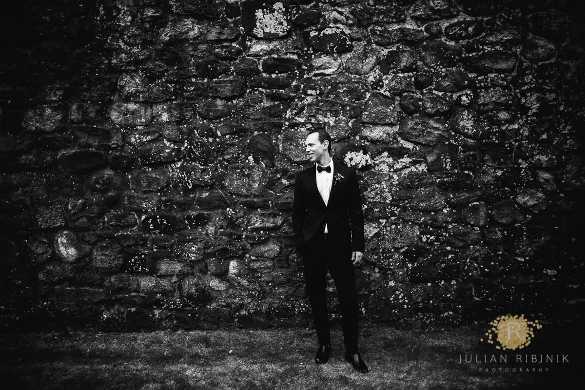 Black and white photo of the handsome groom