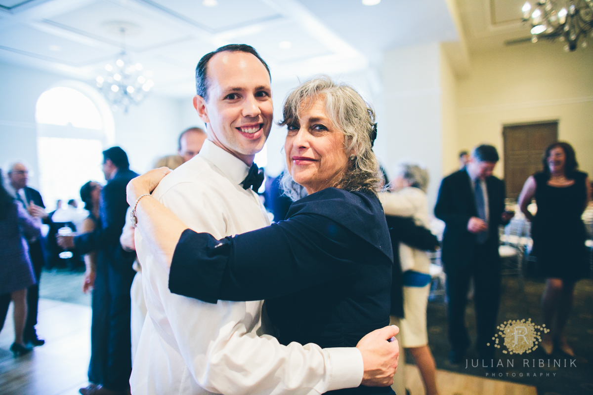 The groom hugs his mother