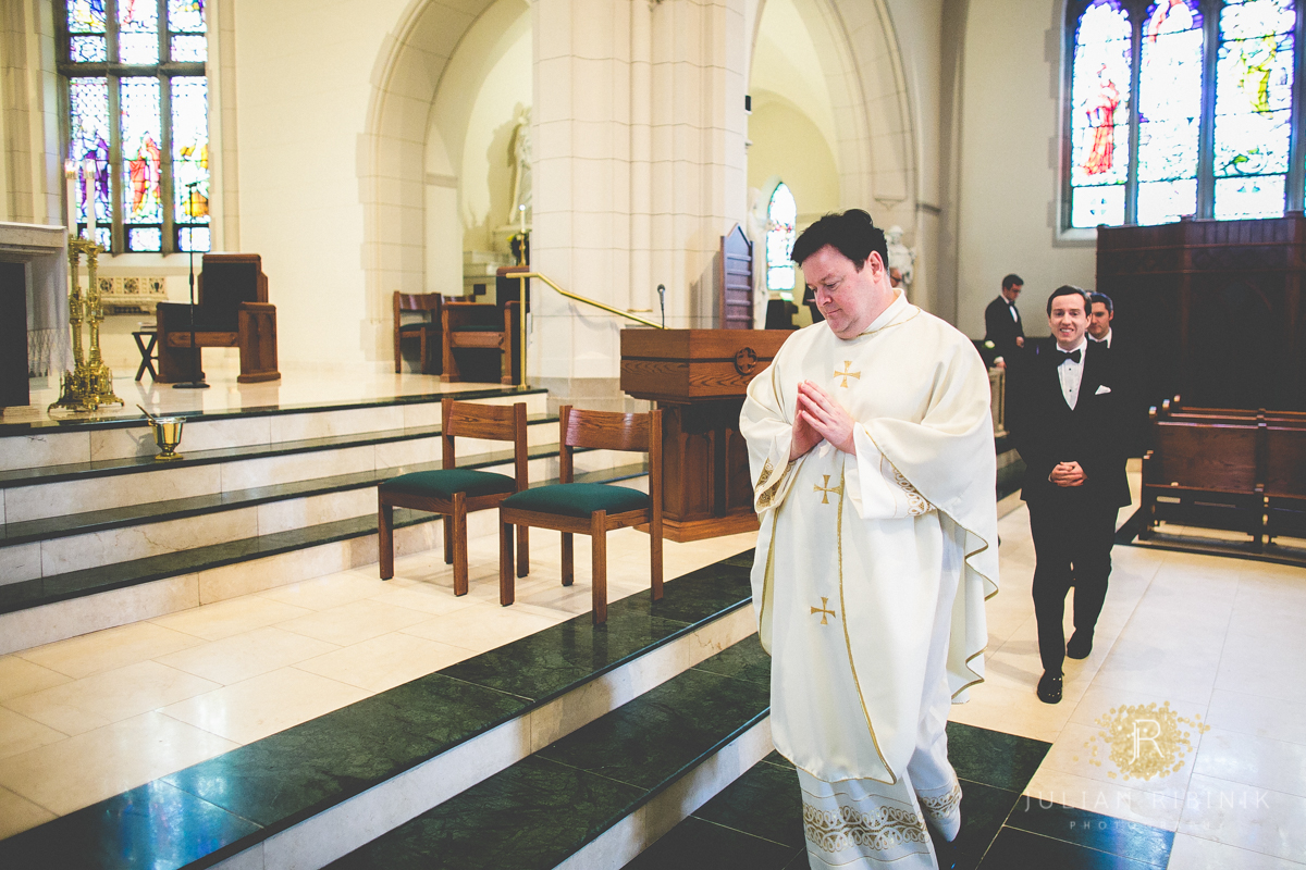 The priest approaches the altar