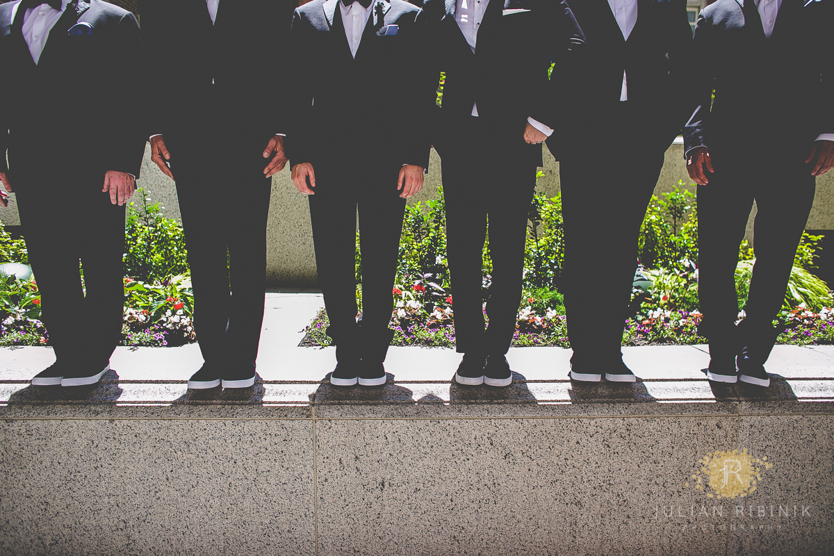 Groomsmen lineup for a photo outside a hotel in Philadelphia
