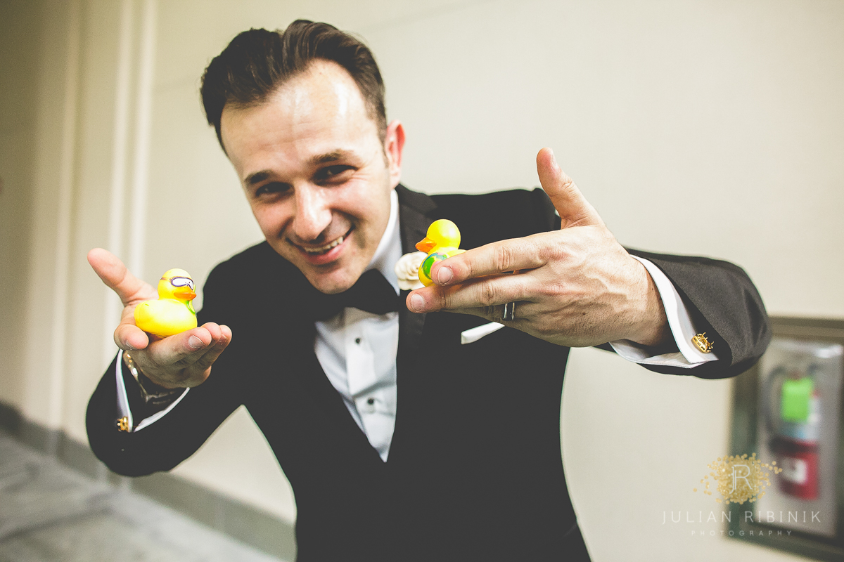 Groom with toys in his hands