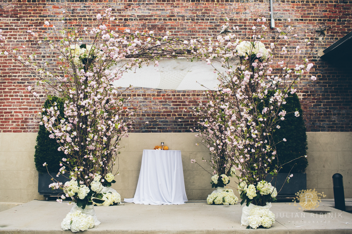 Wedding stage arranged with white flowers