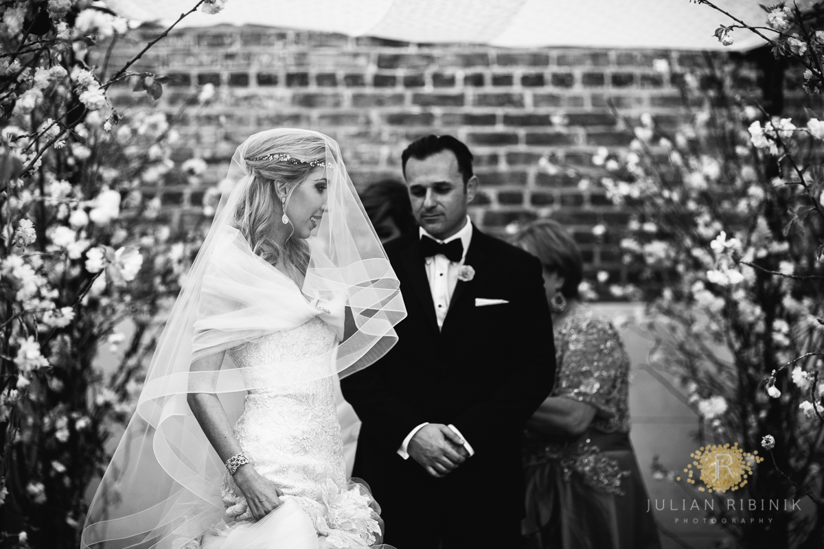 A black and white photo of Jewish bride and groom