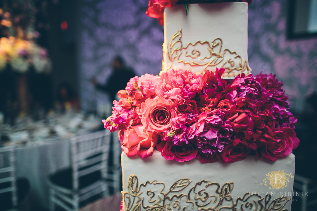 beautiful wedding cake with colorful flowers