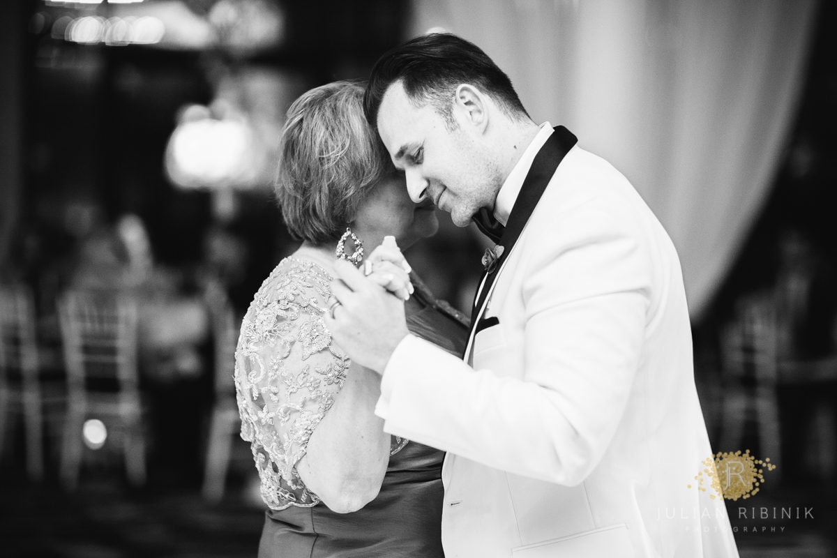 The groom enjoys a dance with his mother