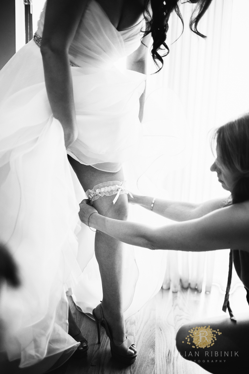 A black and white photo of bride getting ready at a hotel in NY