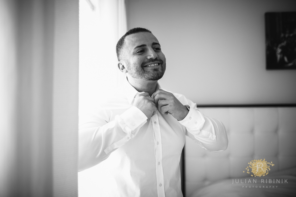 A black and white photo of Groom