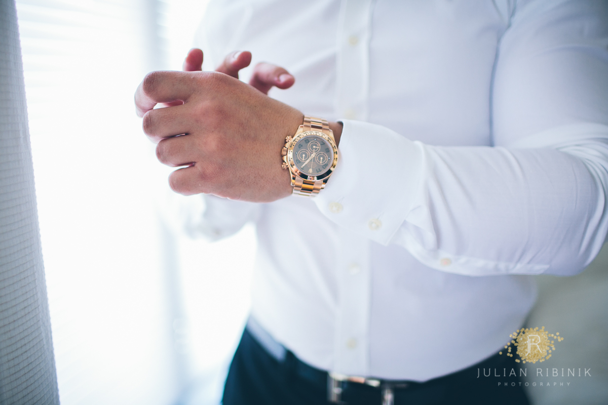 Groom shows his luxury watch