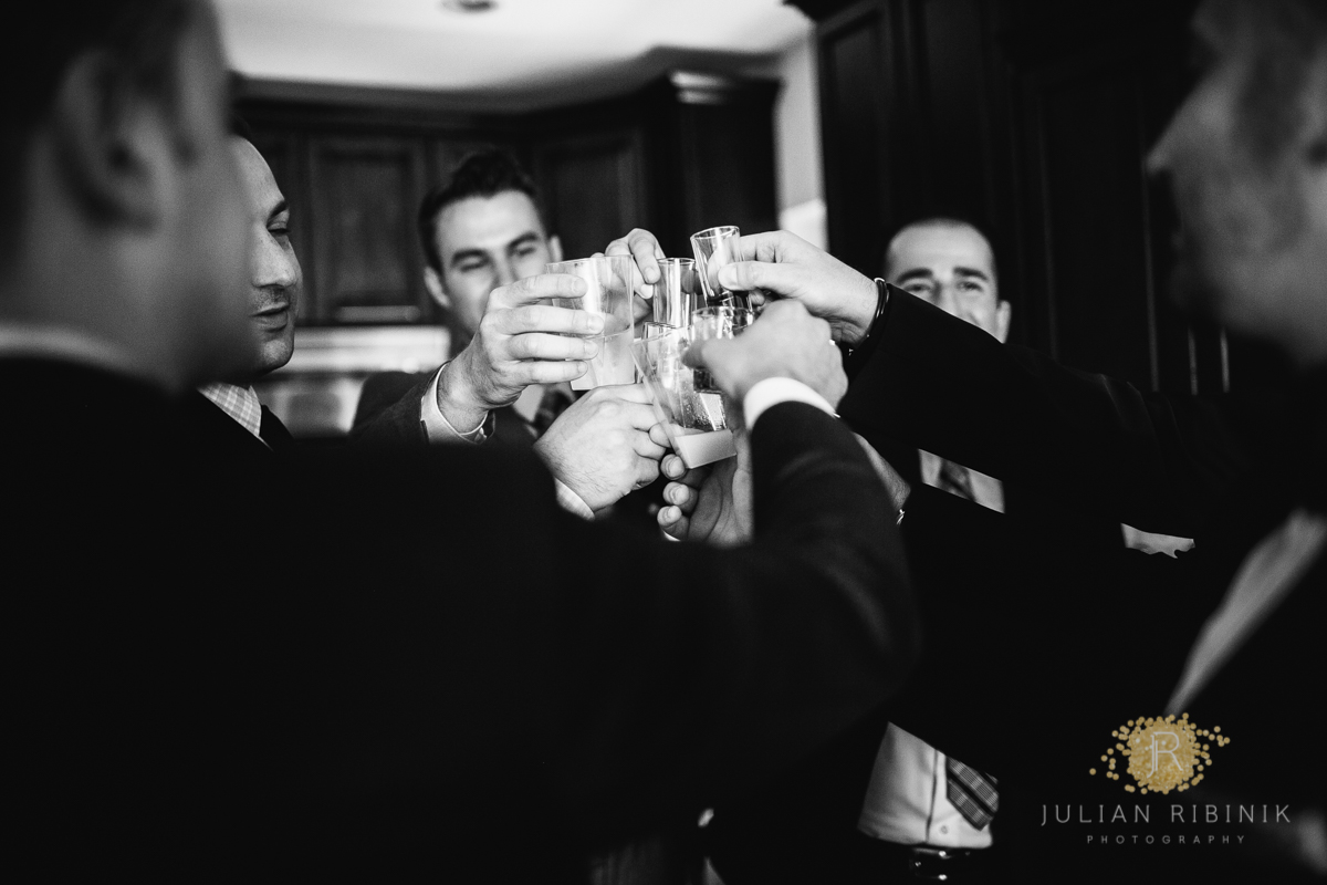 Groom and friends have a wedding toast