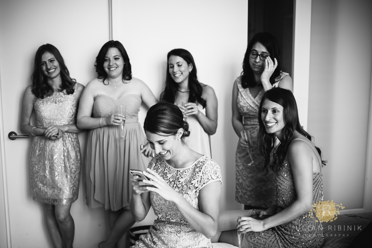 A black and white shot of bride and friends