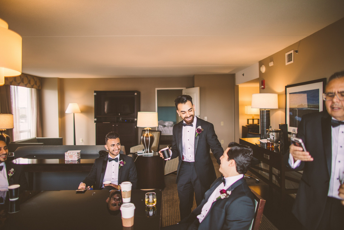The groomsmen enjoying coffee before the wedding