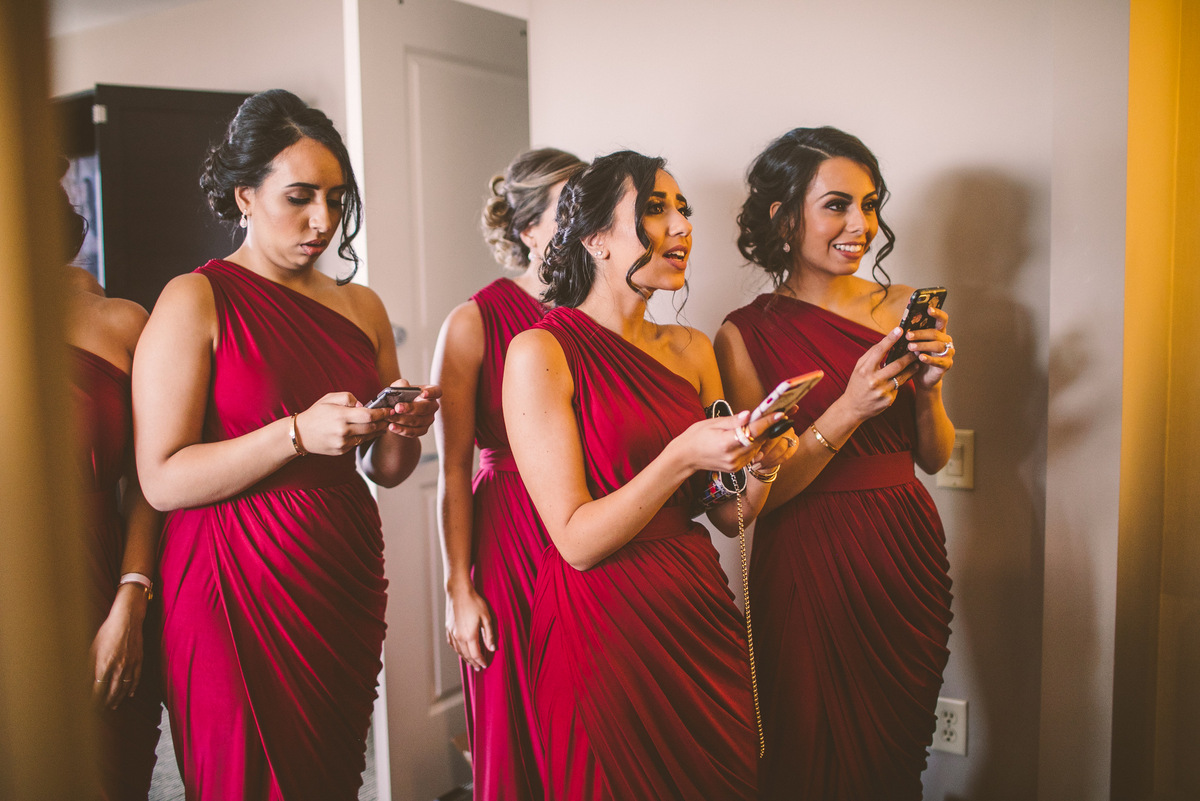 The bridesmaids getting ready to take photos 