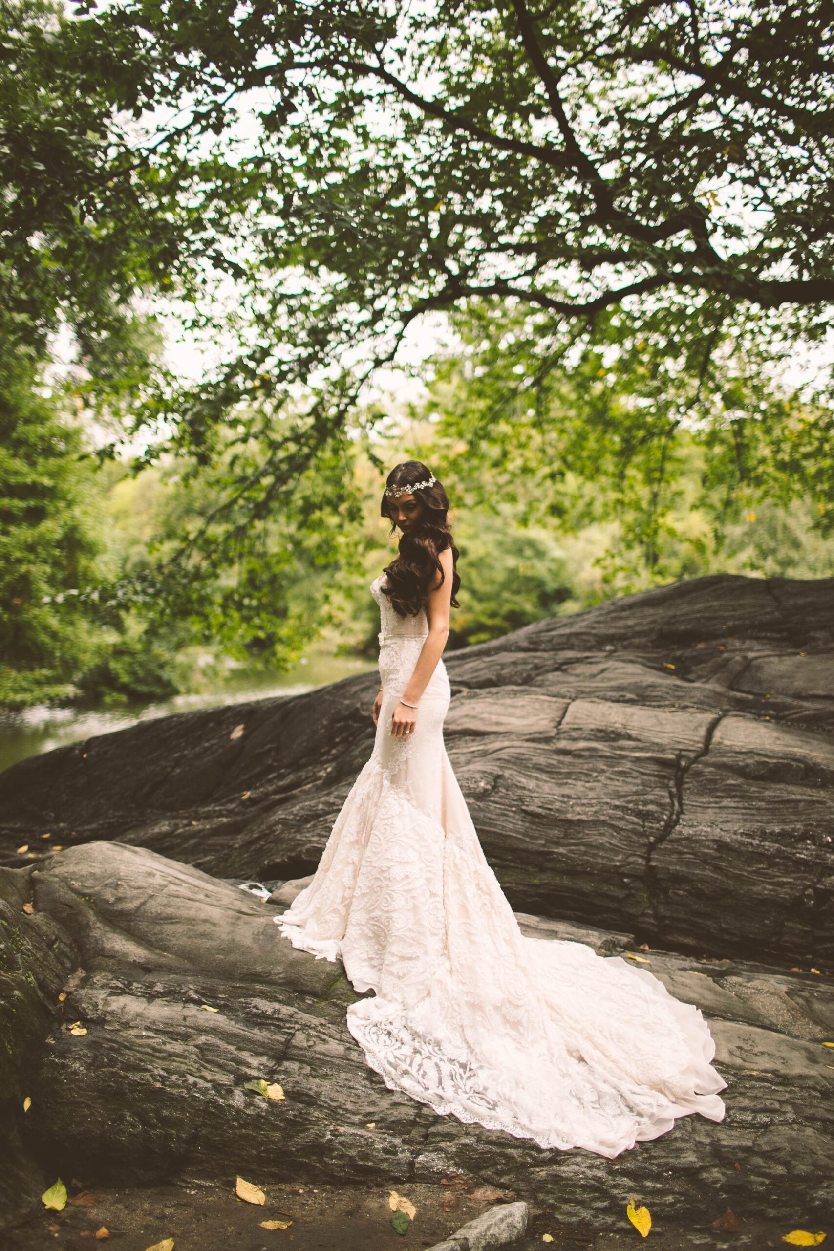 Bride in long white dress in nature — engagement session feel by NYC wedding photographer Julian Ribinik