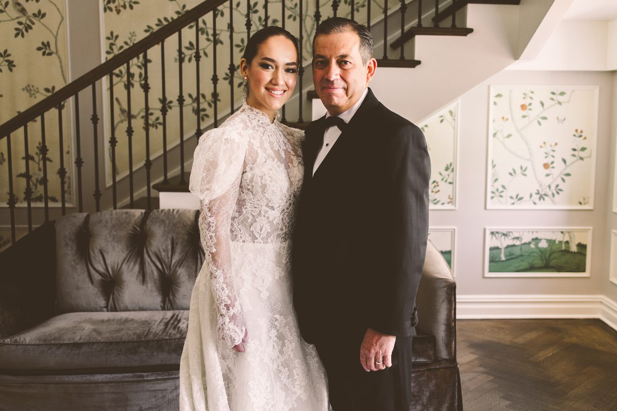 Bride on the staircase in her Pronovias gown