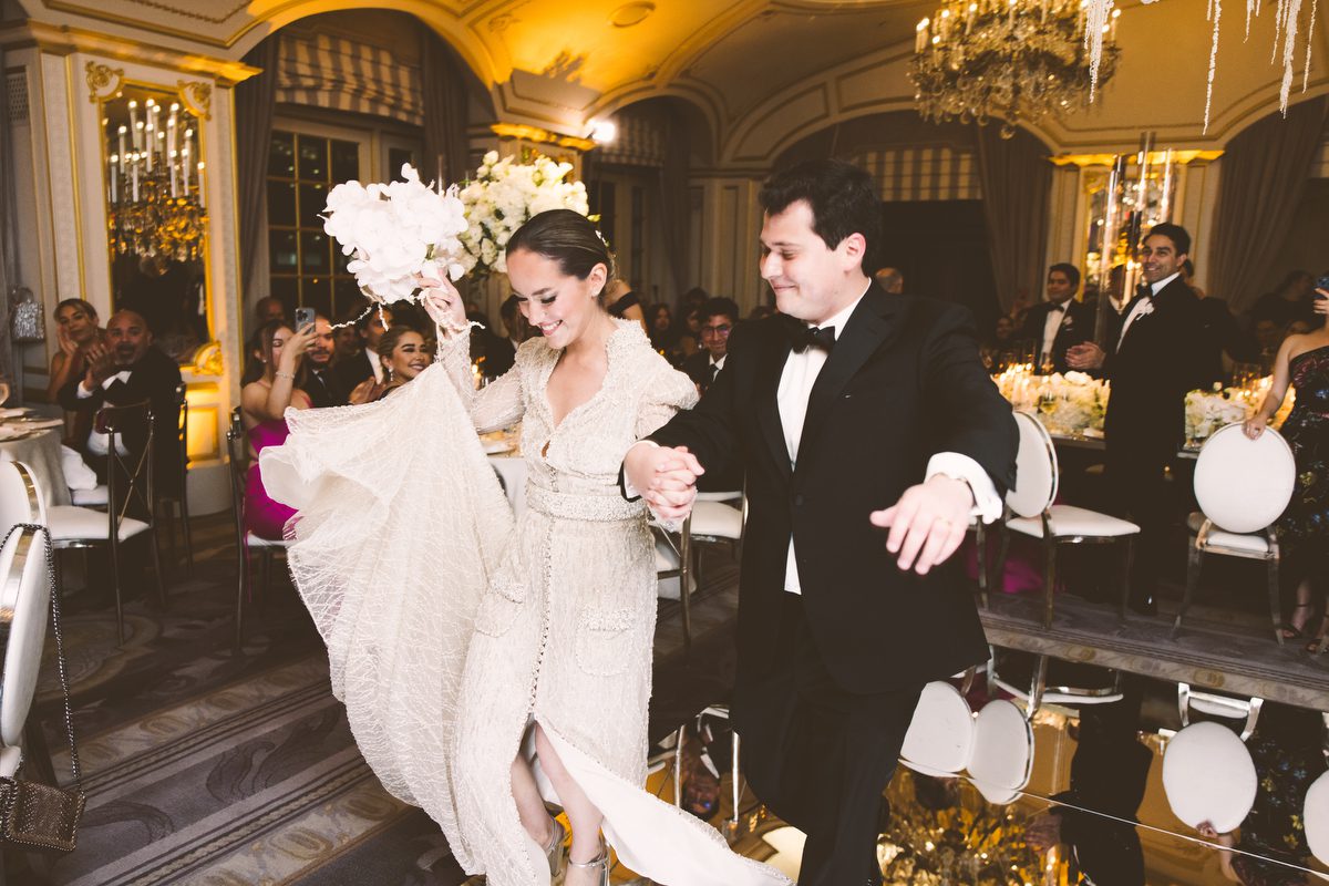 Bride and groom on the mirrored dance floor