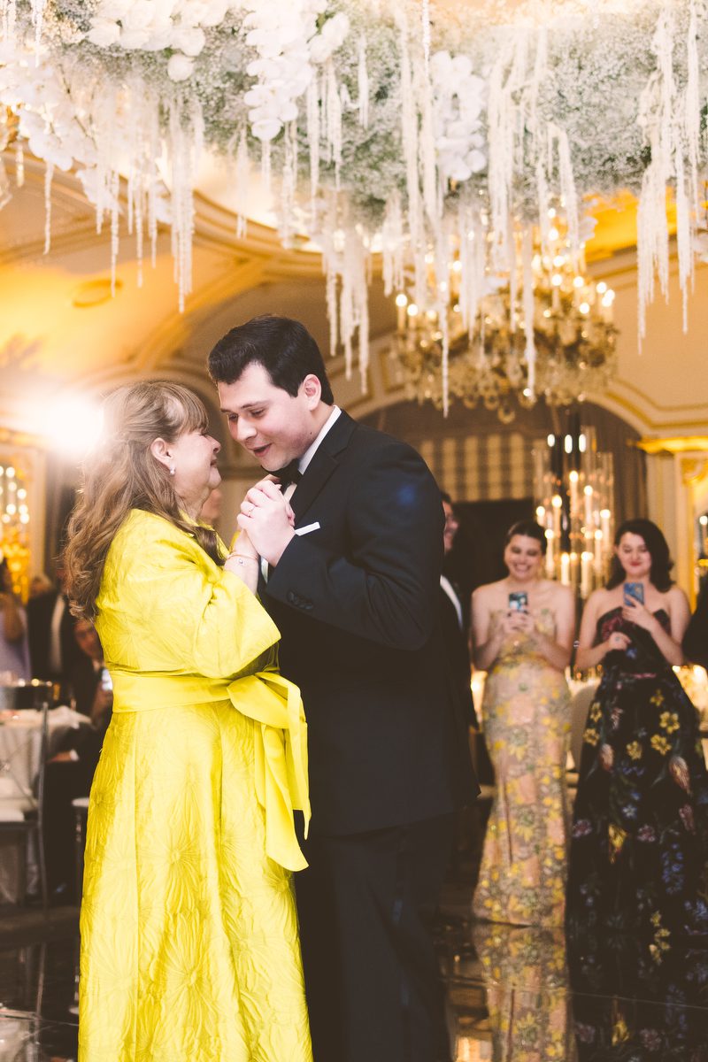 Guests in emerald and magenta on the dance floor