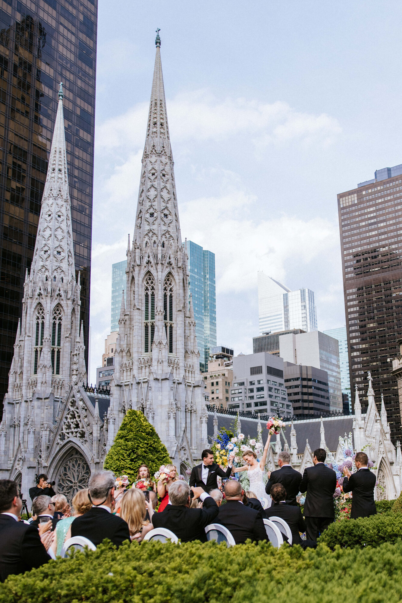 Guests watching the rooftop ceremony