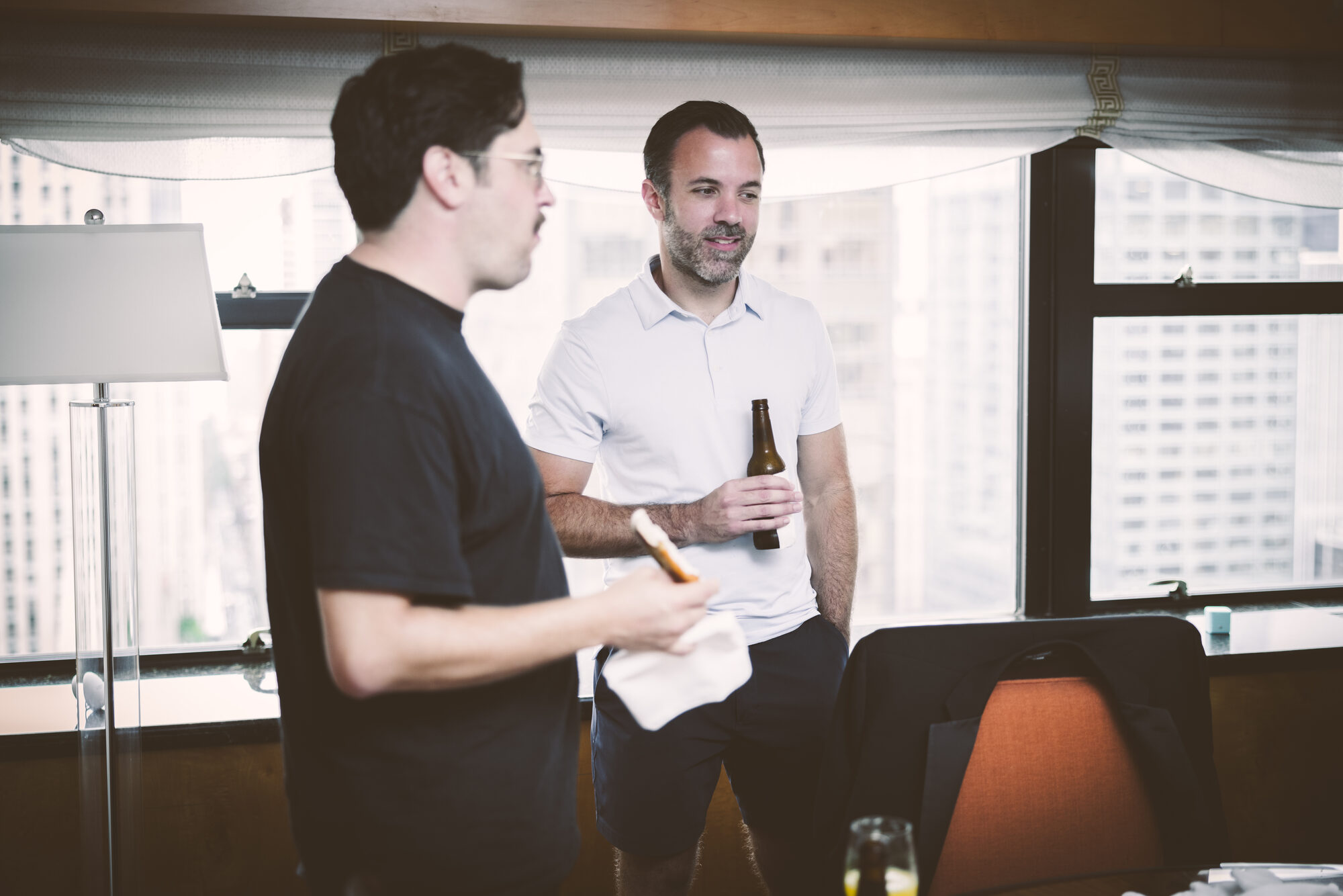 Getting ready with friends in a Manhattan apartment before a Guastavino's NYC wedding
