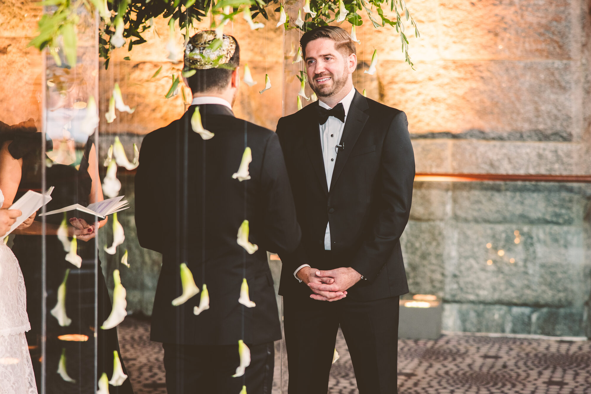 Reading their own vows beneath the chuppah at Guastavino's