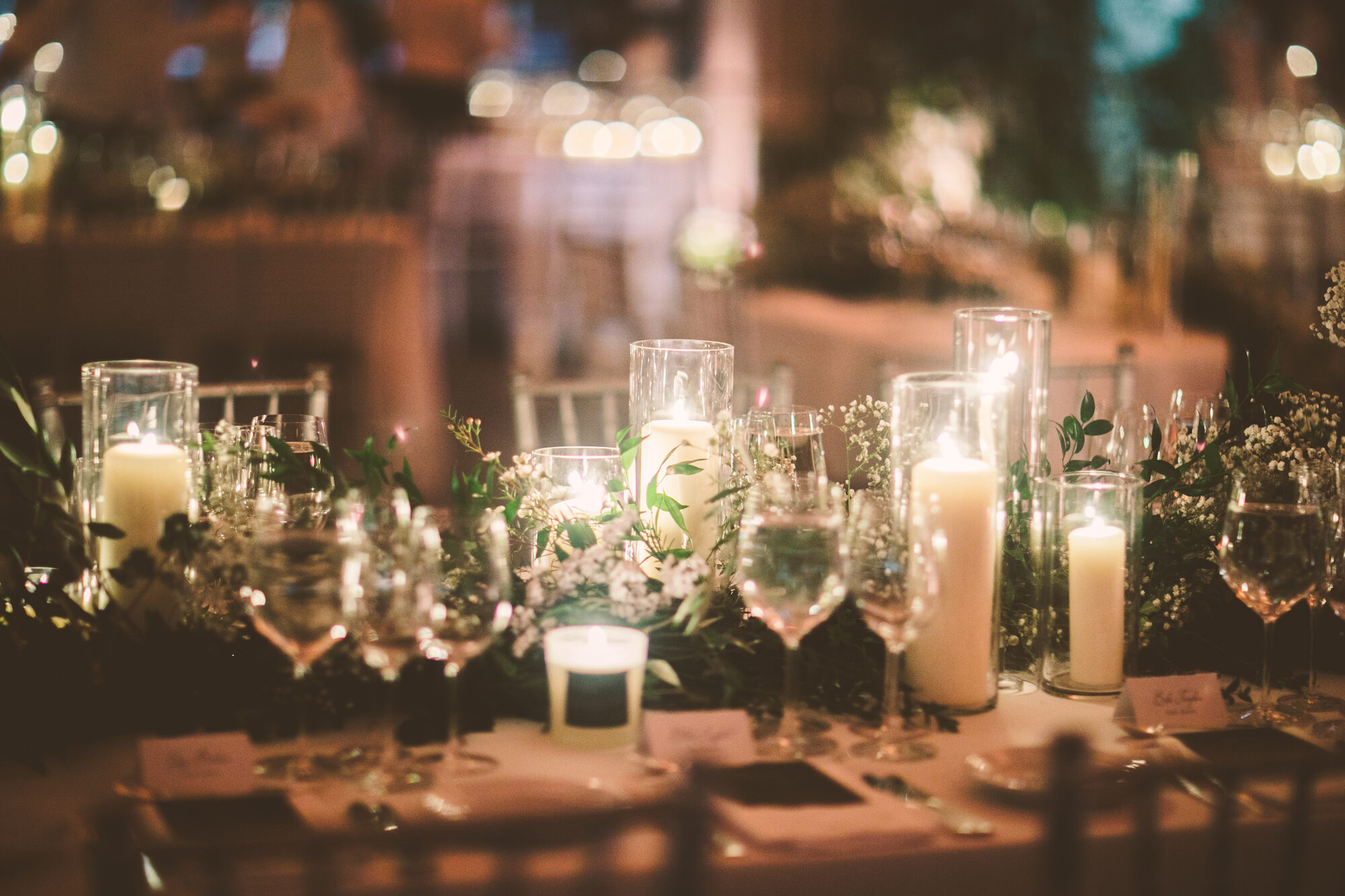 Menu cards and low greenery at a Guastavino's reception