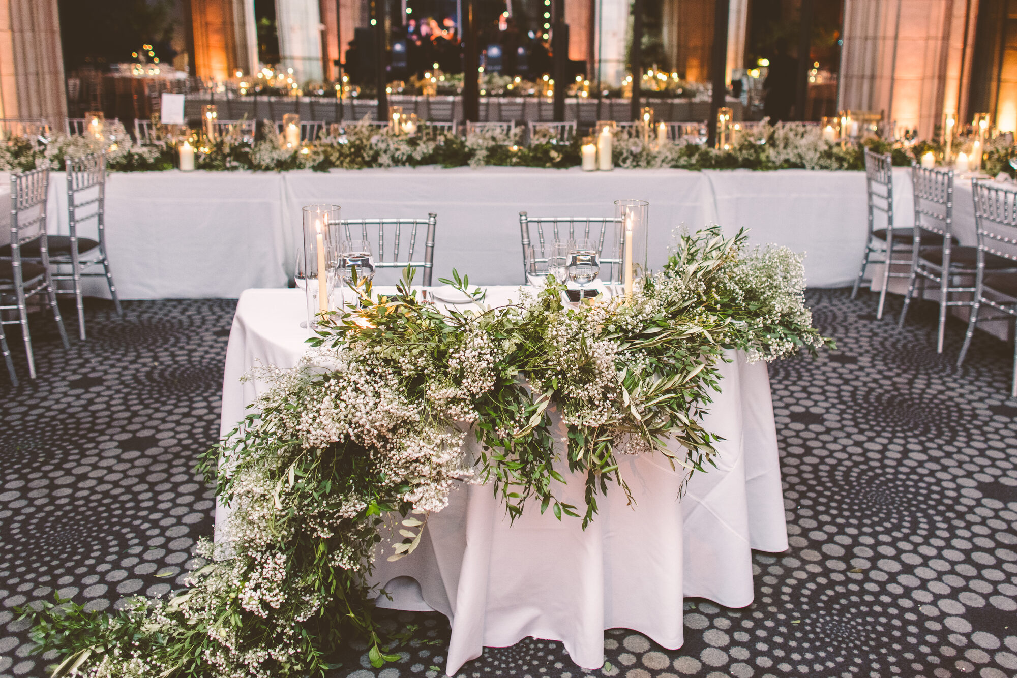 The head table with greenery at a Guastavino's wedding