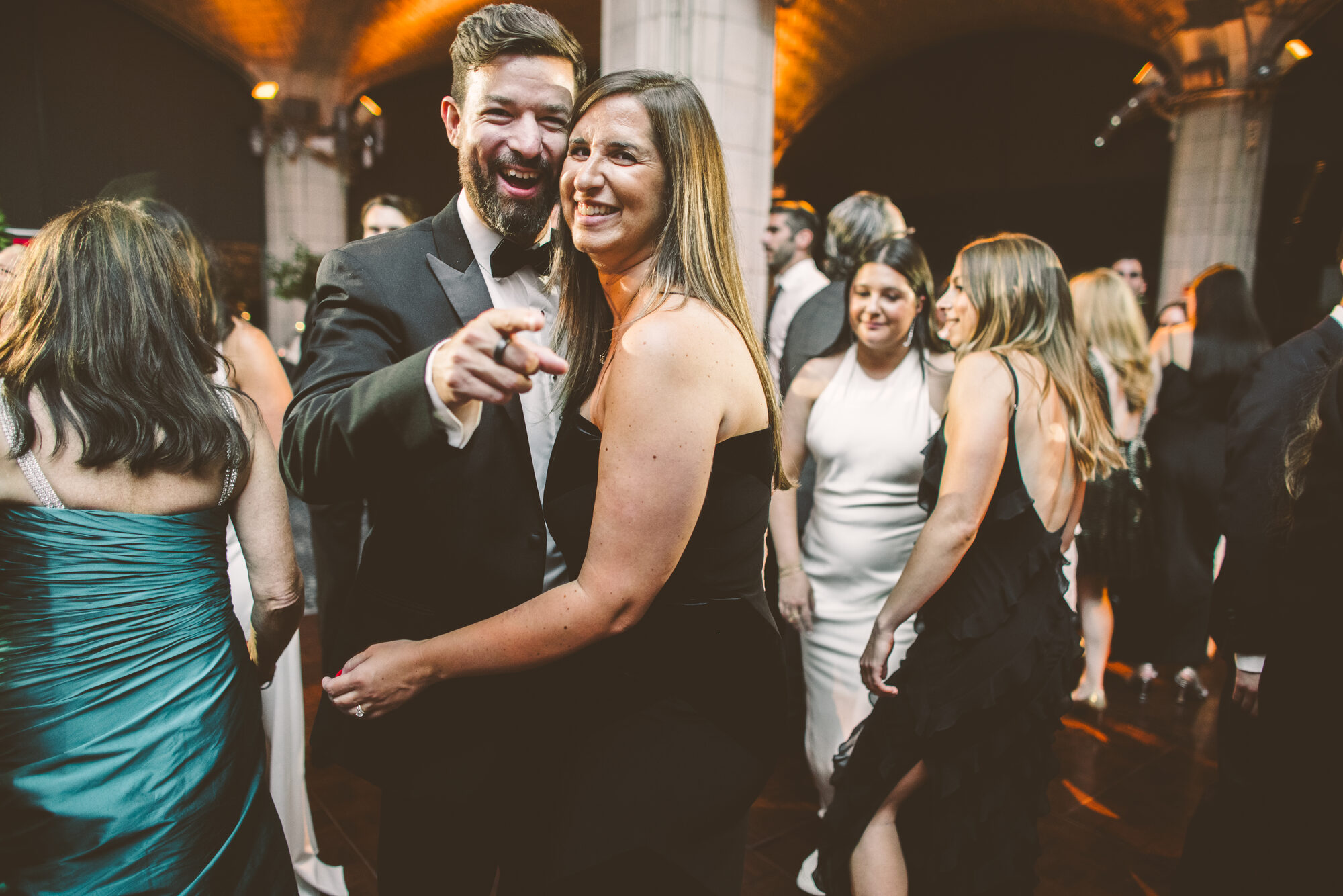 Friends dancing at a black tie wedding in New York City