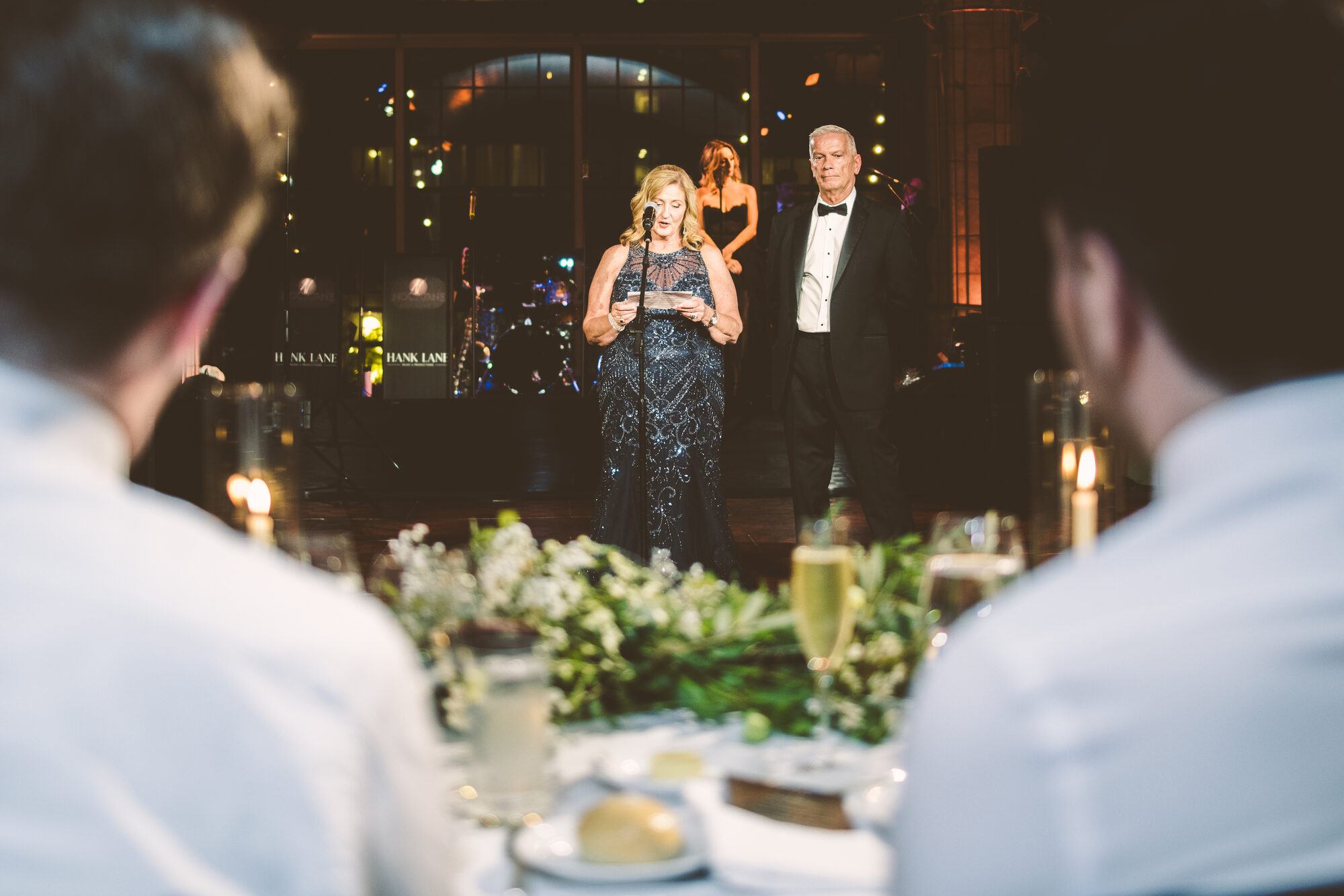 The couple listening to a toast at their Guastavino's wedding