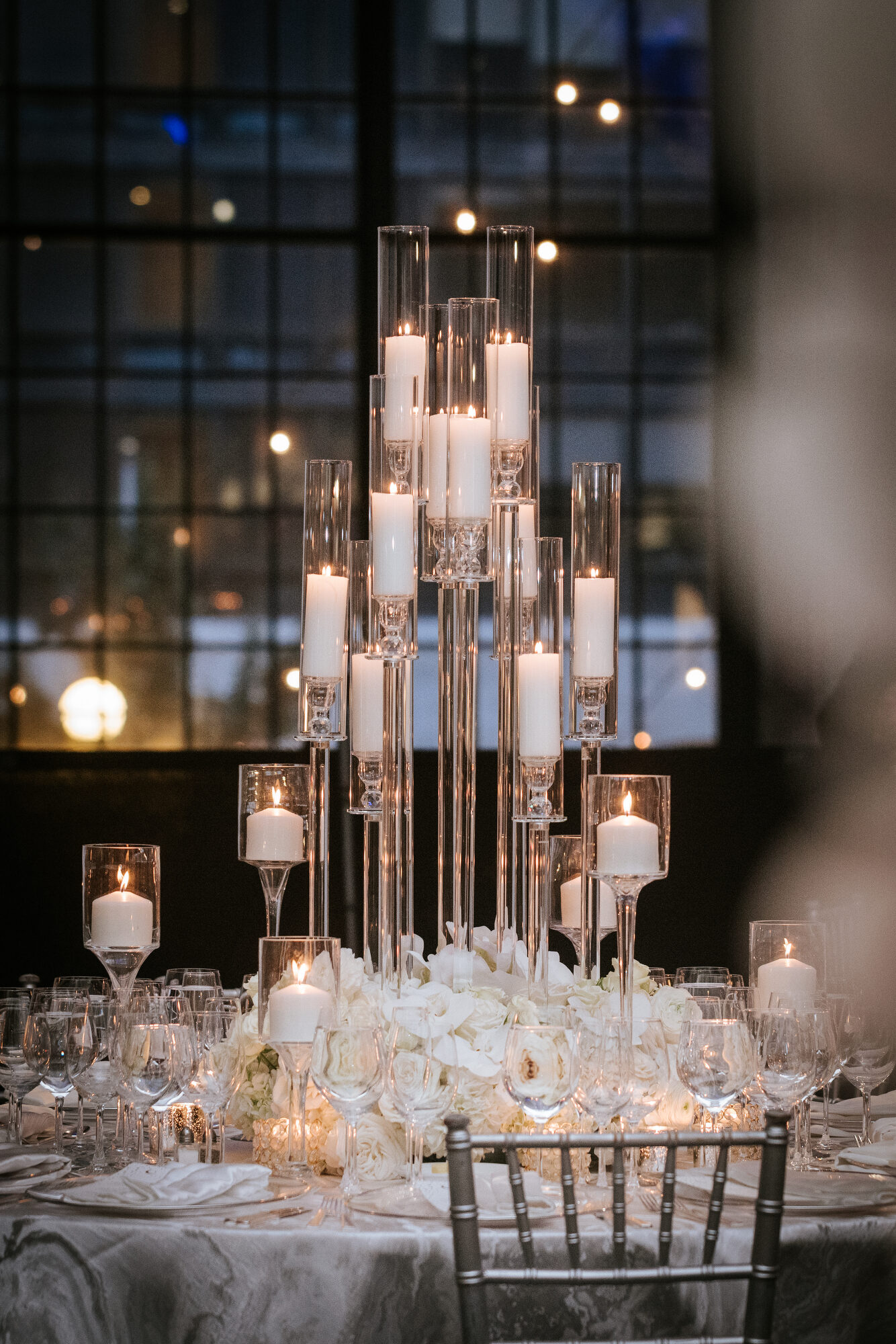 Tall floral centerpiece beneath the vaults