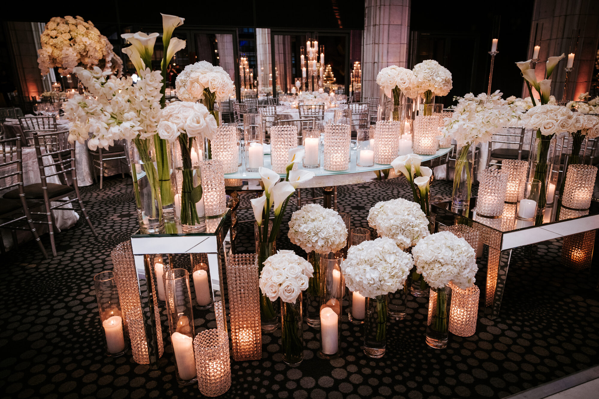 Reception tablescape with crystal and candlelight