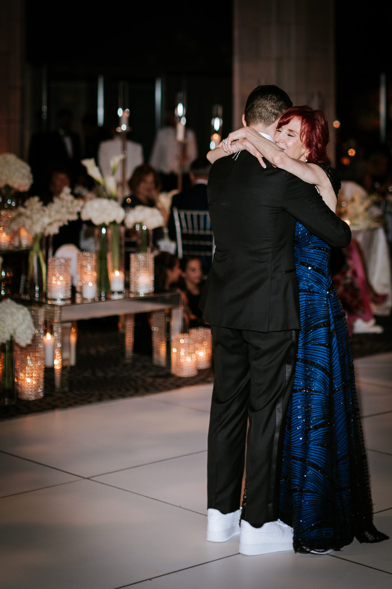 Couple sharing cake at their reception