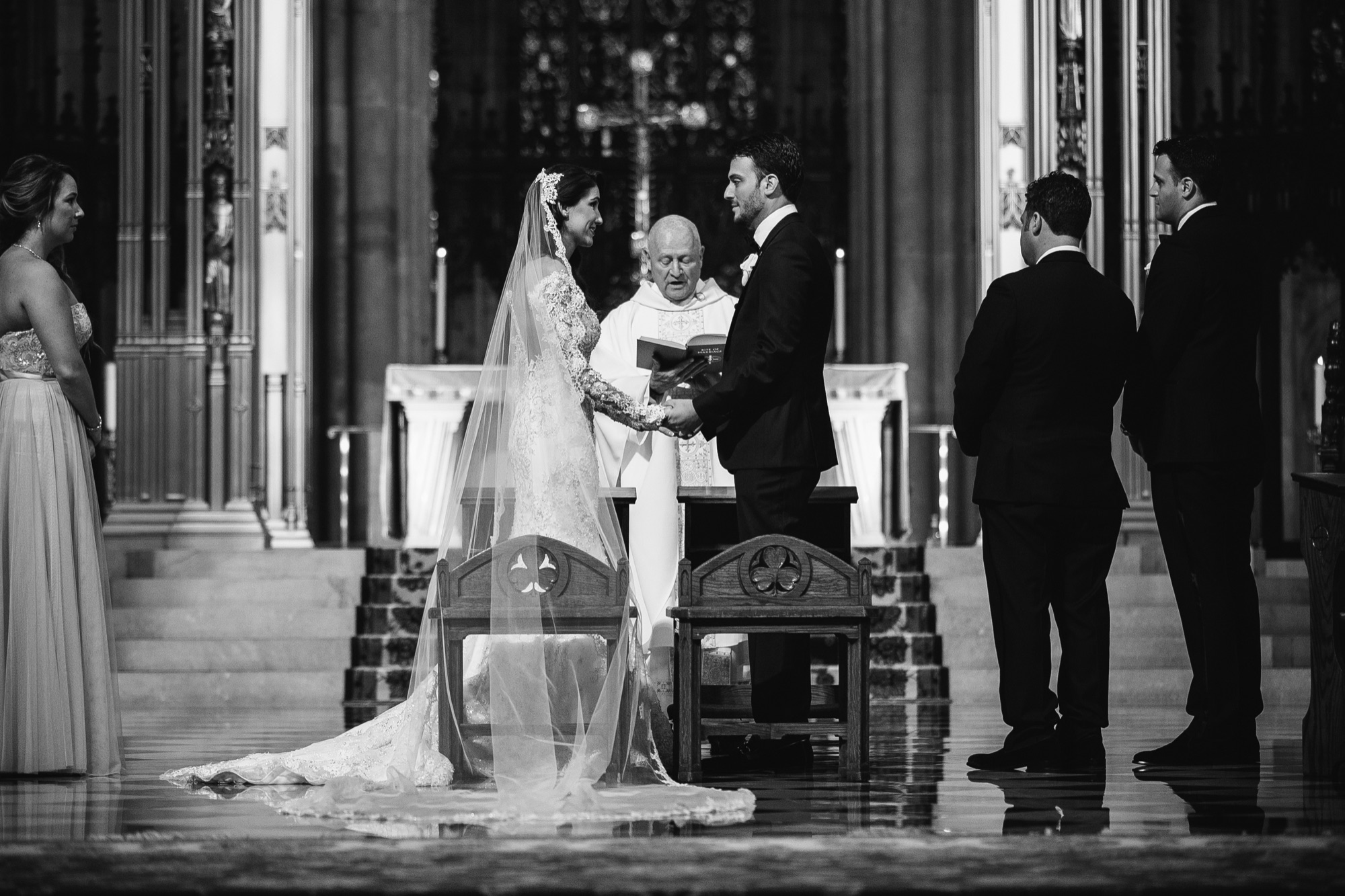 Black and white photograph of the ceremony at the cathedral altar