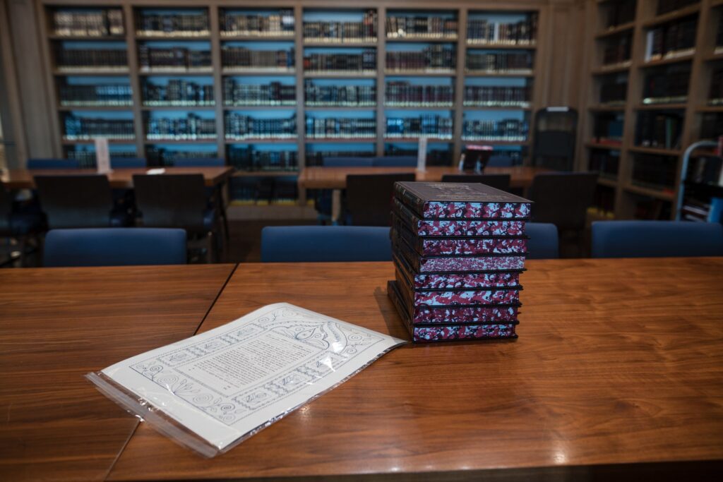 The ketubah laid out on the table in the library at Ohel Yaacob before the signing