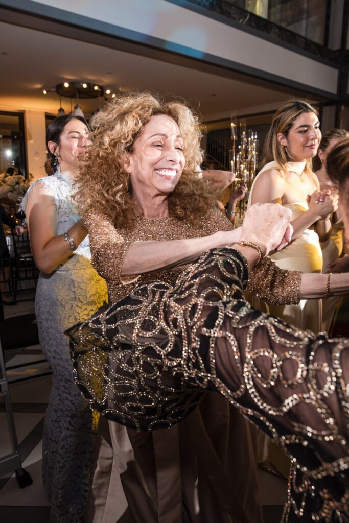 A mother lifted off her feet on the dance floor