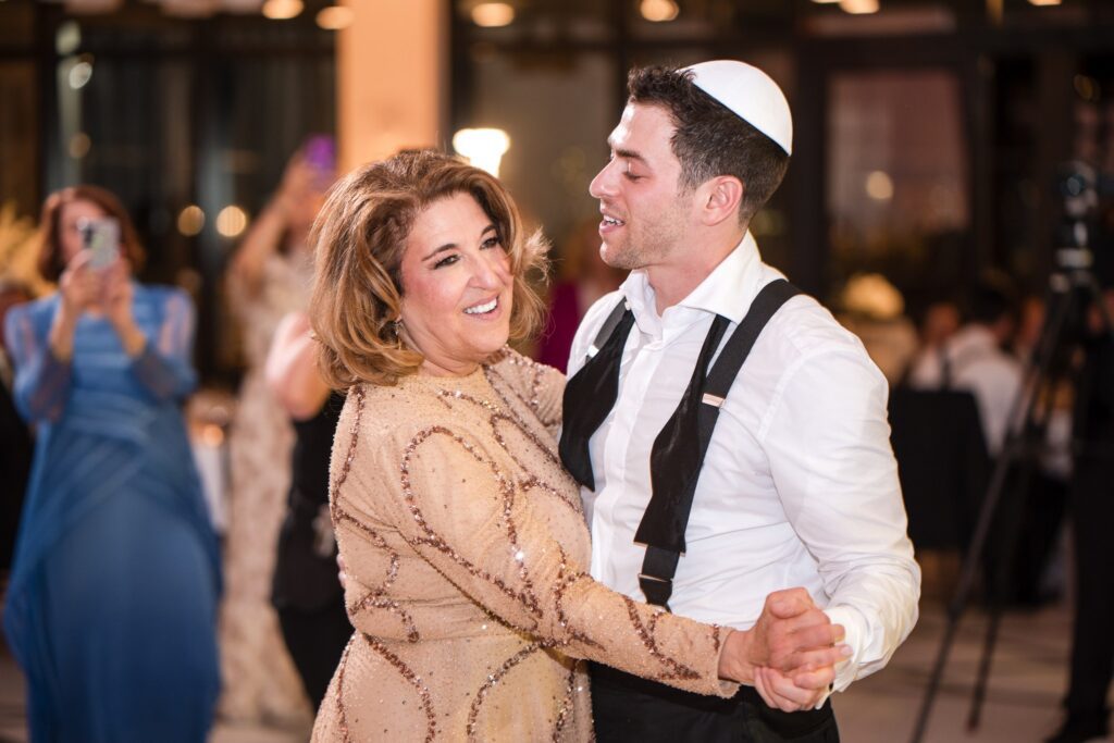 Gordon dancing with his mother late in the night