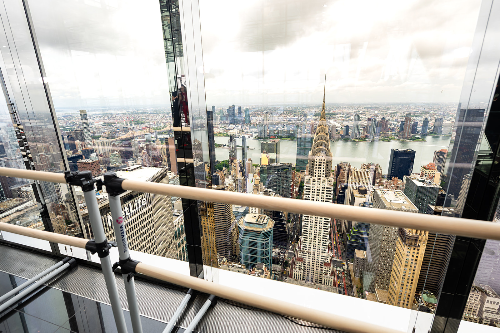 The view east from SUMMIT on the 72nd floor, the Chrysler Building and the East River below