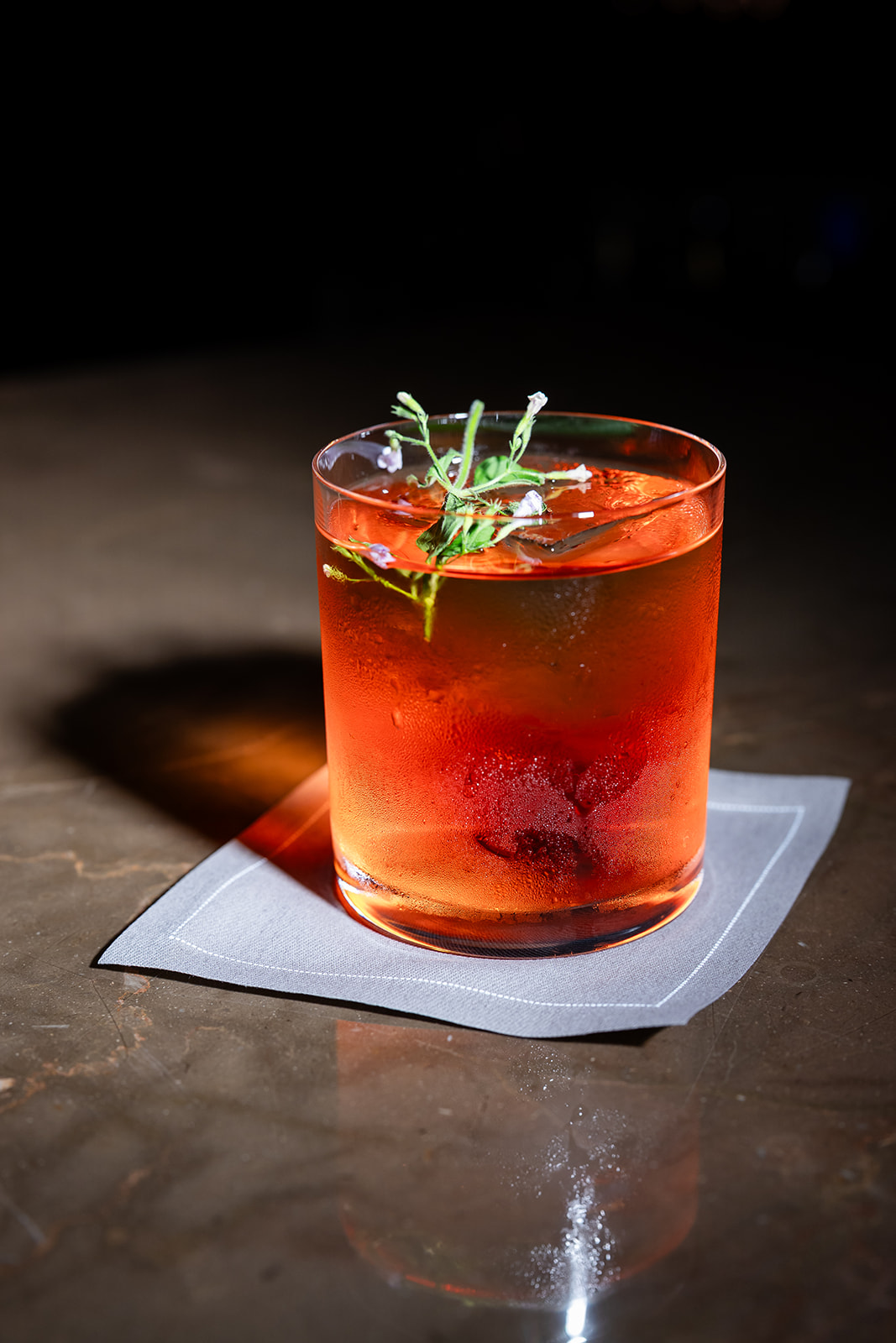 Red cocktail served at The Jazz Club at Aman New York