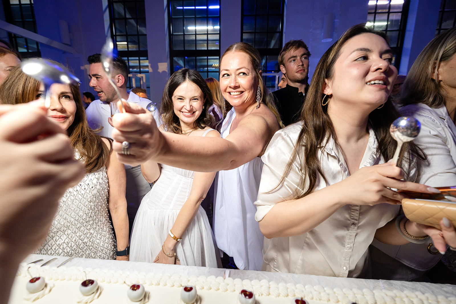 WIPA New York guests sharing dessert during the party