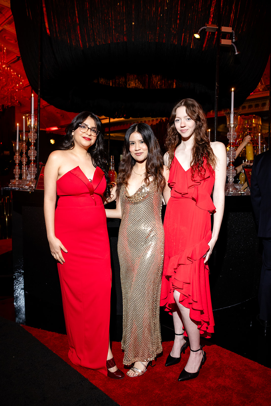Three guests posing together during the Highstyle gala reception