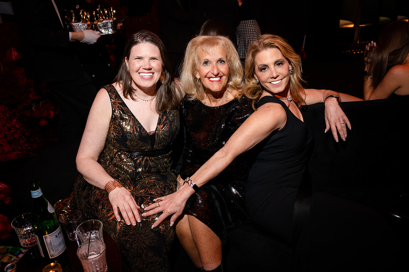 Friends laughing together at the Highstyle Rentals gala