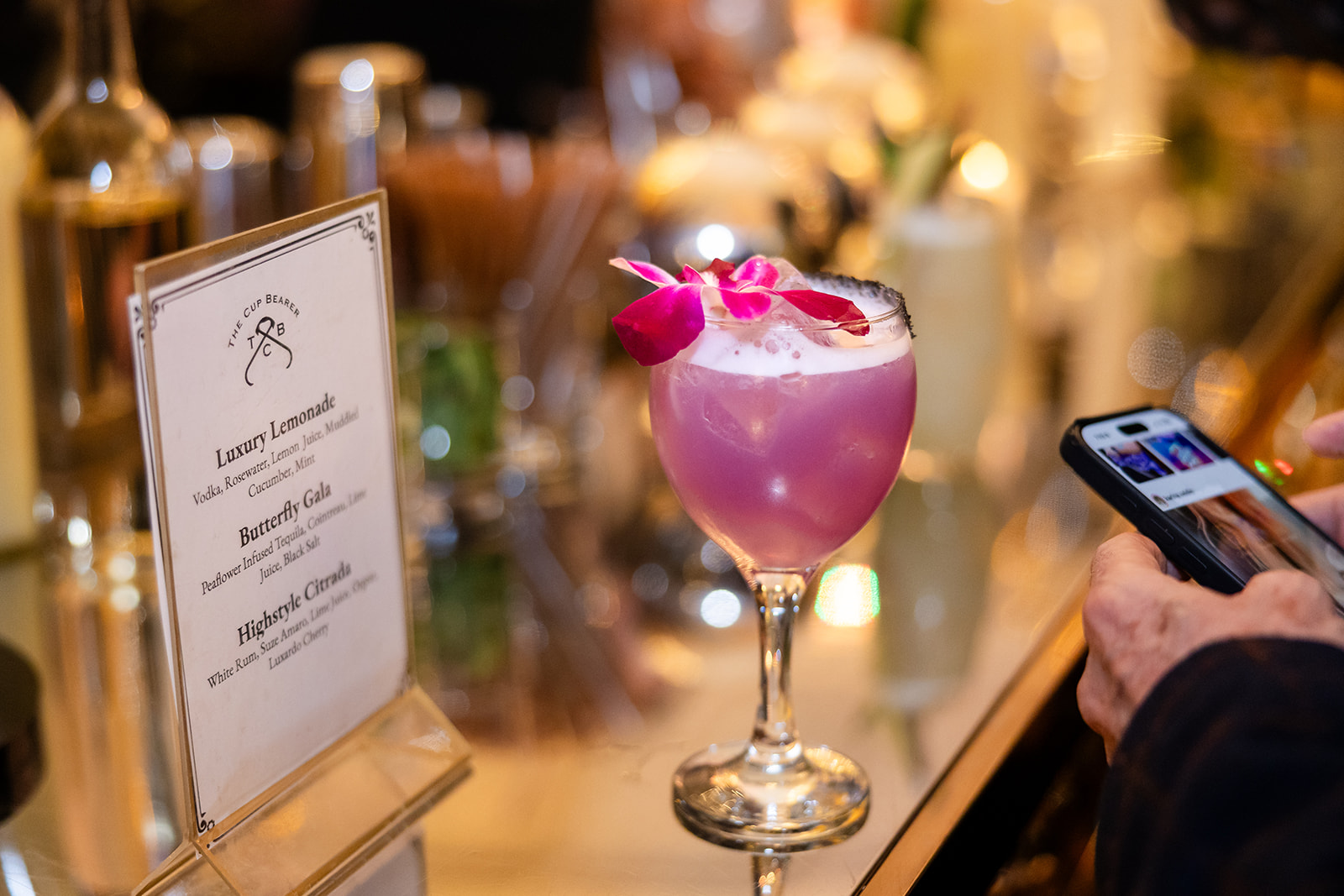 Signature purple cocktail served at the Highstyle Rentals gala