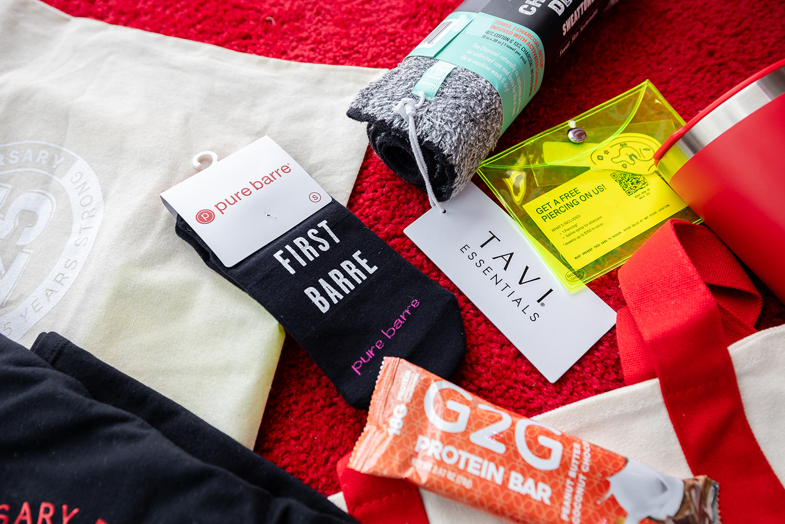 Pure Barre anniversary gifts and partner products arranged for guests