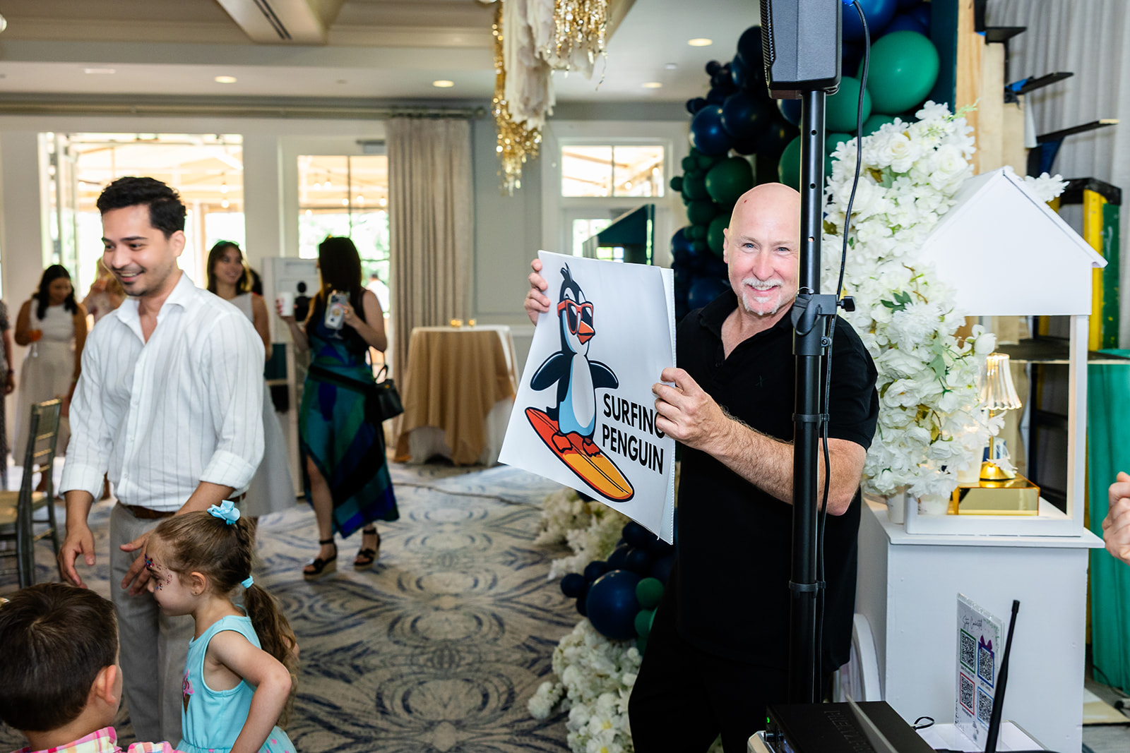 Entertainer engaging guests during a first birthday party